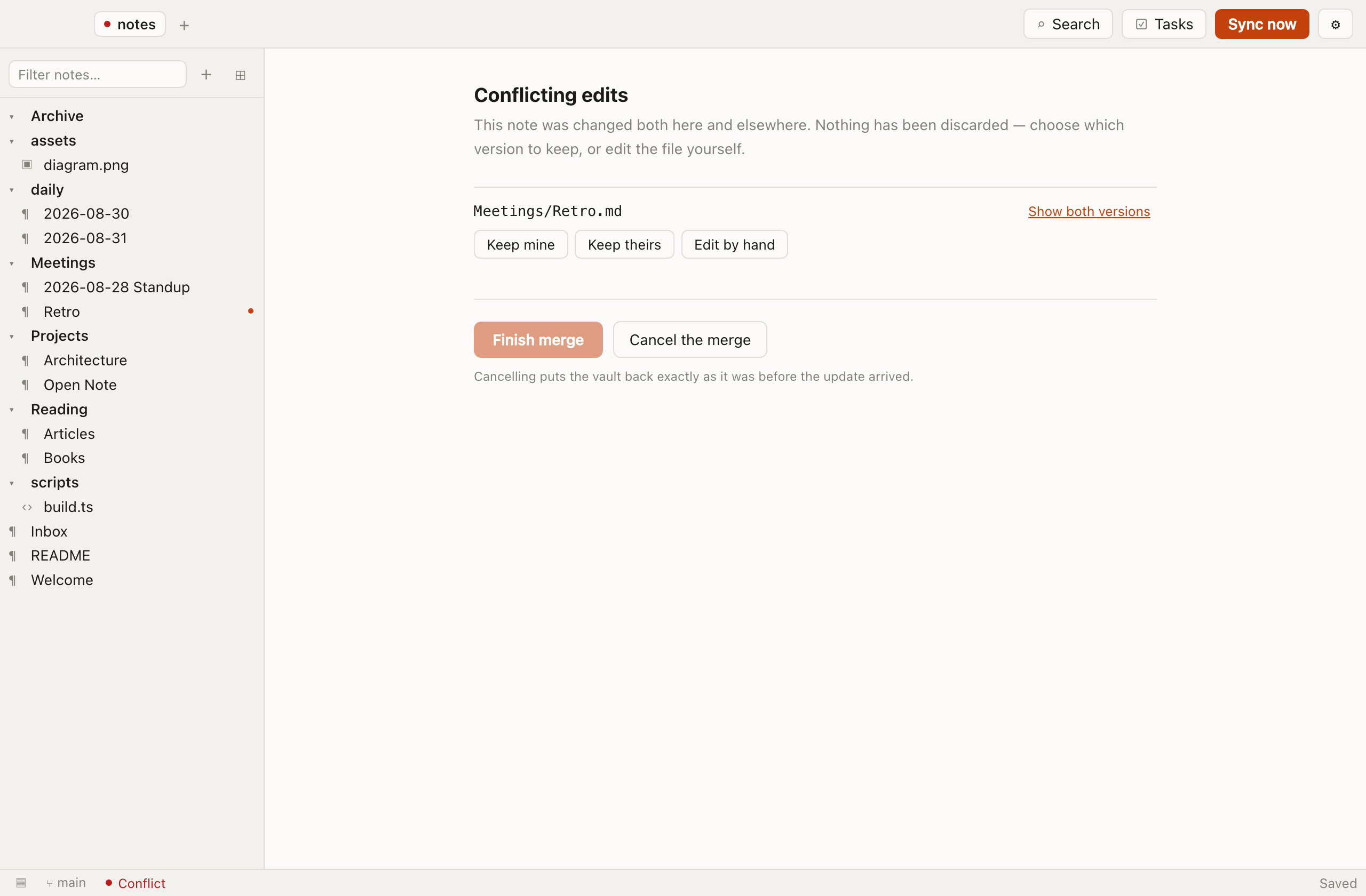 The conflict screen, listing the conflicted file with options to keep either side or merge by hand.